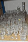 A QUANTITY OF CUT CRYSTAL, comprising five Brierley vintage champagne glasses, three decanters (