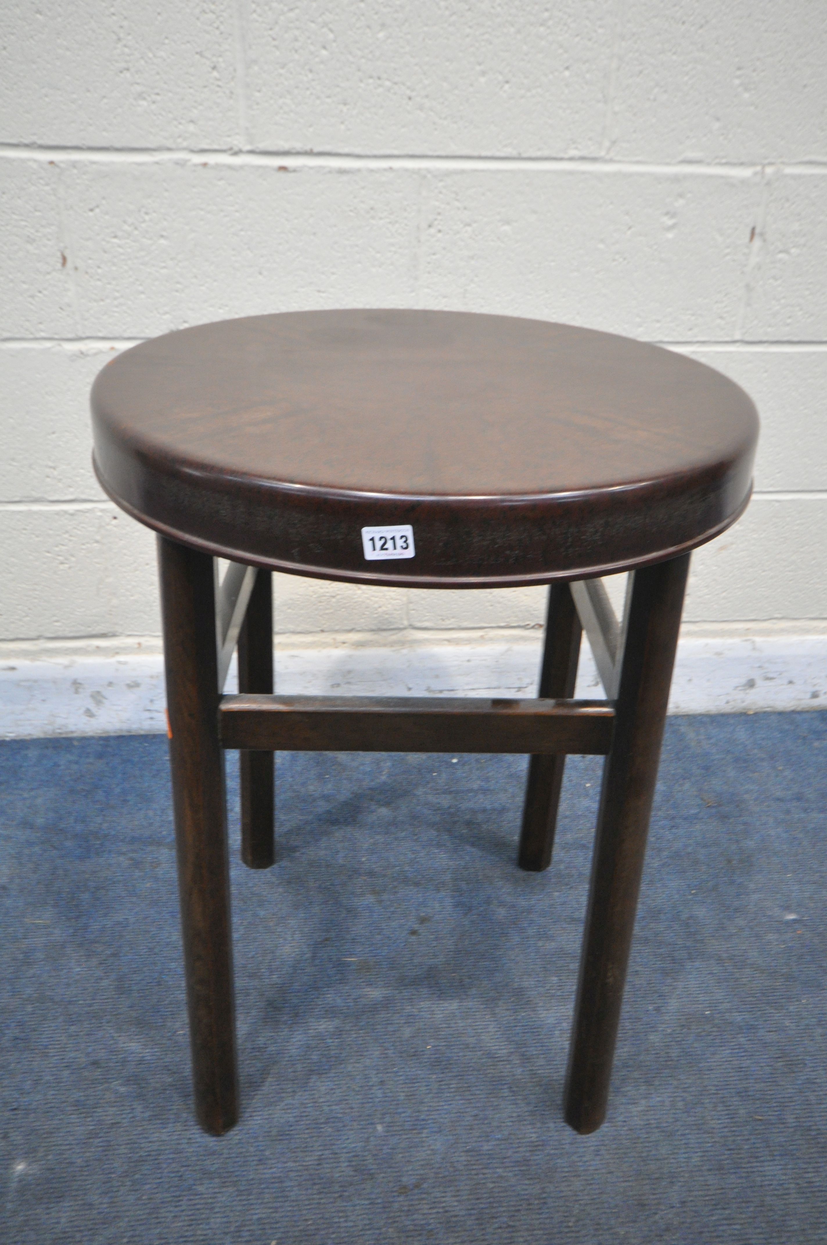 A MID CENTURY BAKELITE CIRCULAR OCCASIONAL TABLE, on a stained wooden base, diameter 55cm x height - Image 2 of 2