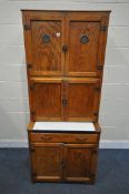 A MID CENTURY LUSTY PRODUCT OAK MAIDSAVER KITCHEN CABINET, made up of three double door cupboards