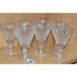 SEVEN WATERFORD CRYSTAL GLASSES, in the Tranmore pattern, comprising two large wine glasses, and