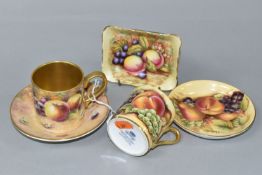 A COFFEE CAN AND SAUCER HAND PAINTED BY ROYAL WORCESTER ARTIST BRYAN COX, painted with apples,