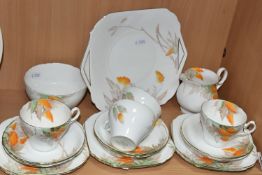 A NINETEEN PIECE SHELLEY 'ORANGE WISTERIA' PATTERN PART TEA SET, with printed and tinted foliate