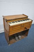 A 19TH CENTURY CRANE AND SONS LTD OF LONDON AND LIVERPOOL OAK CASED HARMONIUM, that folds away to