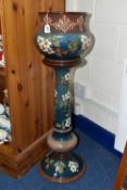 A LANGLEY STONEWARE JARDINIERE ON A PEDESTAL DECORATED IN TONES OF TEAL AND BROWN, decorated with