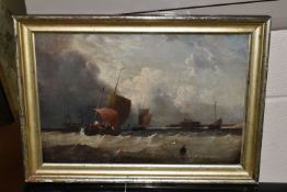 A LATE 19TH / EARLY 20TH CENTURY MARITIME SCENE, fishing boats are working in choppy seas with a