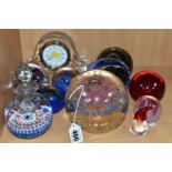 A GROUP OF GLASS PAPERWEIGHTS AND A WATERFORD CRYSTAL MANTEL CLOCK, comprising a Waterford Wharton