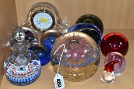 A GROUP OF GLASS PAPERWEIGHTS AND A WATERFORD CRYSTAL MANTEL CLOCK, comprising a Waterford Wharton