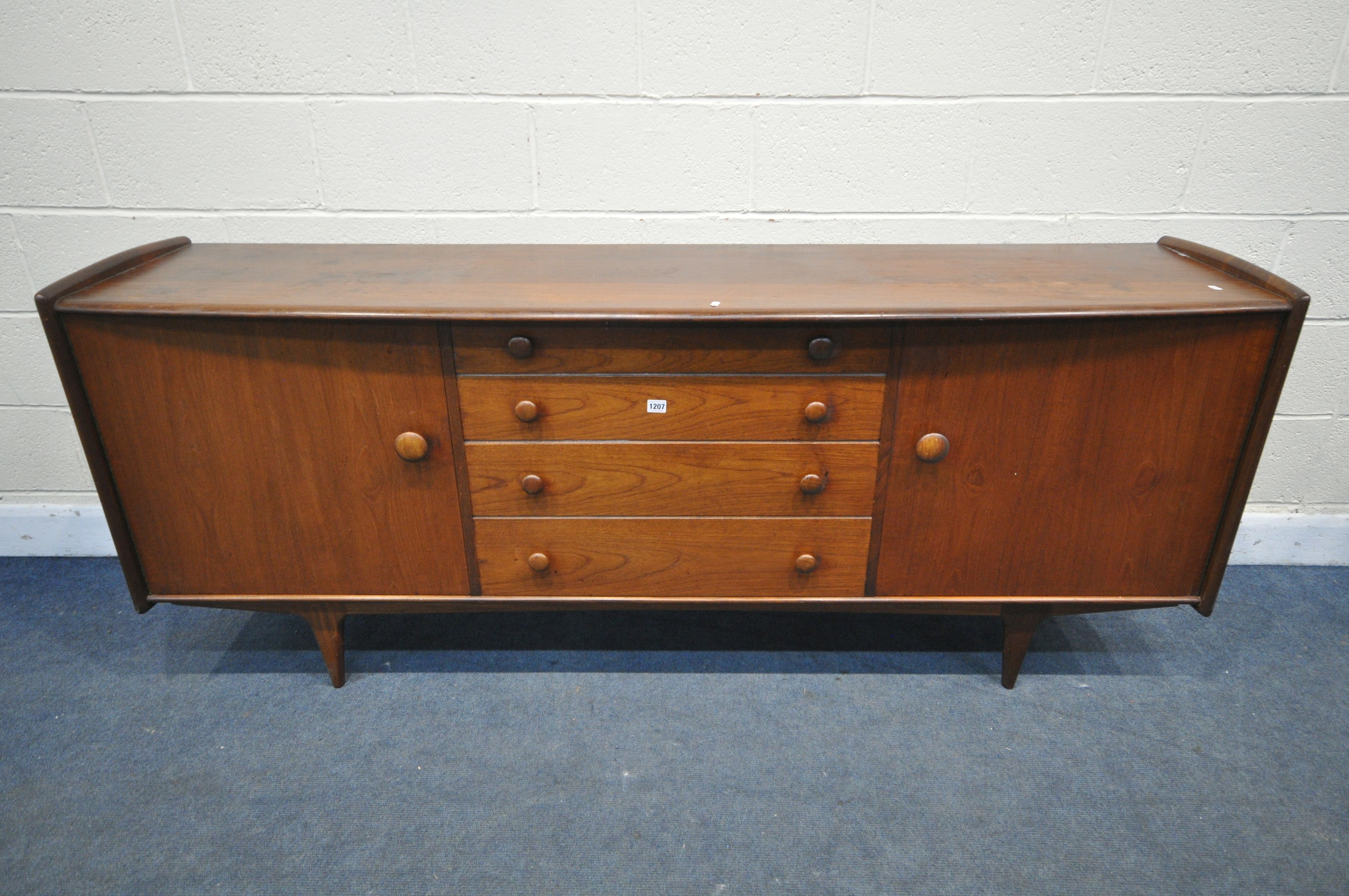 A MID CENTURY AFROMOSIA TEAK 'VOLNAY' SIDEBOARD, DESIGNED BY JOHN HERBERT FOR YOUNGER, with cupboard