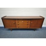 A MID CENTURY AFROMOSIA TEAK 'VOLNAY' SIDEBOARD, DESIGNED BY JOHN HERBERT FOR YOUNGER, with cupboard