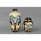 TWO OLD TUPTON WARE VASES, decorated in the style of Charles Rennie Mackintosh, with stylised