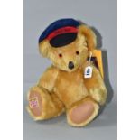 A MERRYTHOUGHT LIMITED EDITION 'RETURN TO SENDER' TEDDY BEAR, no 15/75, height approximately 35cm,
