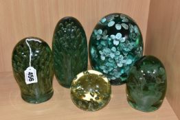 FIVE LARGE VICTORIAN GREEN DUMP GLASS PAPERWEIGHTS, comprising a large paperweight with interior