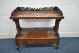 A VICTORIAN ROSEWOOD BUFFET, the top shelf with an open fretwork gallery, supported on bobbin turned