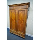 A 19TH CENTURY WALNUT PANELLED TWO DOOR ARMOIRE, with a single drawer, width 141cm x depth 56cm x