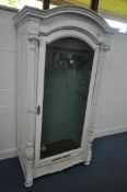 A 19TH CENTURY PAINTED FRENCH PINE ARMOIRE, with a single glazed door, width 107cm x depth 61cm x