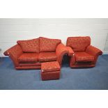 A RED UPHOLSTERED THREE PIECE LOUNGE SUITE, comprising a two seater settee, length 191cm, armchair