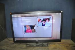 A BUSH LE55GB2A 55in TV on stand (no remote) (PAT pass and working) (Condition Base is slightly
