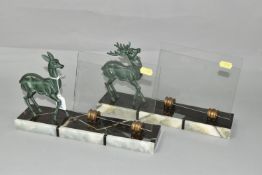 A PAIR OF FRENCH ART DECO PHOTOGRAPH FRAMES, the verdigris finish bronzed stag and doe on