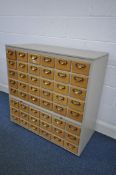 AN BESPOKE PAINTED BANK OF FOURTY EIGHT INDEX DRAWERS, with the carcass being made fit, and fitted