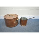 A LARGE COPPER TWO HANDLED BOILING POT WITH LID together with a smaller tall single handled sauce