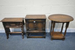 A CARVED OAK TRESTLE STORAGE UNIT, width 54cm x depth 21cm x height 55cm, an oak two door cabinet,