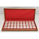 A CASED COLLECTION OF FIFTY 20TH CENTURY STERLING SILVER PROOF INGOTS, '1000 Years of British