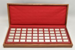 A CASED COLLECTION OF FIFTY 20TH CENTURY STERLING SILVER PROOF INGOTS, '1000 Years of British