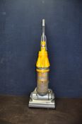 A DYSON DC07 UPRIGHT VACUUM CLEANER (PAT pass and working) (Condition rear pipe appears to be a