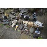 A LARGE SELECTION OF SMALL GARDEN FIGURES (20+)