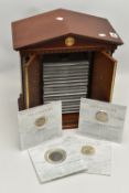 A FRANKLIN MINT MILLENNIUM COIN COLLECTION, to include first century to twentieth century coinage