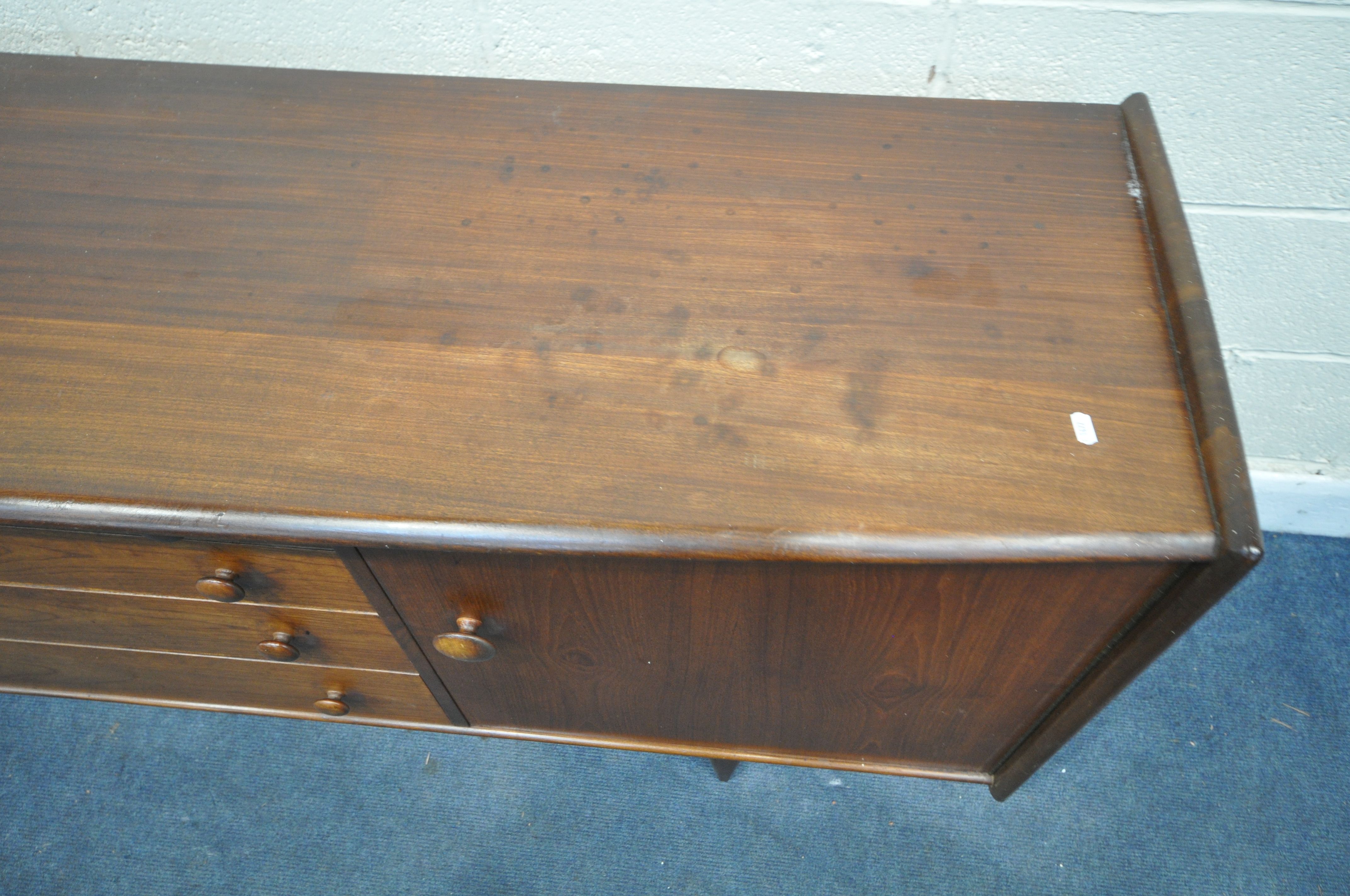 A MID CENTURY AFROMOSIA TEAK 'VOLNAY' SIDEBOARD, DESIGNED BY JOHN HERBERT FOR YOUNGER, with cupboard - Image 3 of 6
