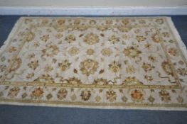 A WOOLLEN INDIAN ZEIGLER PATTERN RUG, 254cm x 154cm (condition report: -good)