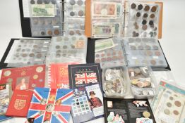 FOUR SMALL ALBUMS CONTAINING COINS AND BANKNOTES, to include Early Ten and One Pound banknotes