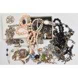 AN ASSORTMENT OF WHITE METAL JEWELLERY, to include a white metal charm bracelet, fitted with a heart