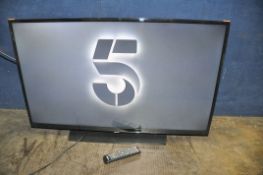 A SAMSUNG UE40H4200AW 40in TV on stand with remote (PAT pass and working)