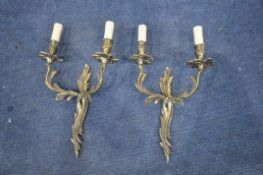 A PAIR OF BRASS FOLIATE WALL MOUNTED TWIN BRANCH WALL SCONCES