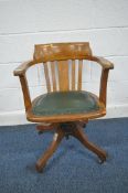AN EARLY 20TH CENTURY OAK SWIVEL OFFICE CHAIR (condition report: -general age related wear and