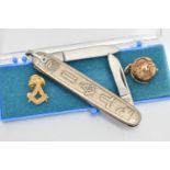 THREE ITEMS OF MASONIC REGALIA, to include a gold plated masonic folding ball pendant, stamped 'Made