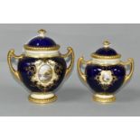 TWO EARLY 20TH CENTURY COALPORT TWIN HANDLED VASES AND COVERS, blue, pale yellow and gilt ground,