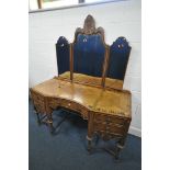 AN EARLY 20TH CENTURY QUARTER VENEER WALNUT AND ROSEWOOD CROSSBANDED DRESSING TABLE, with a triple
