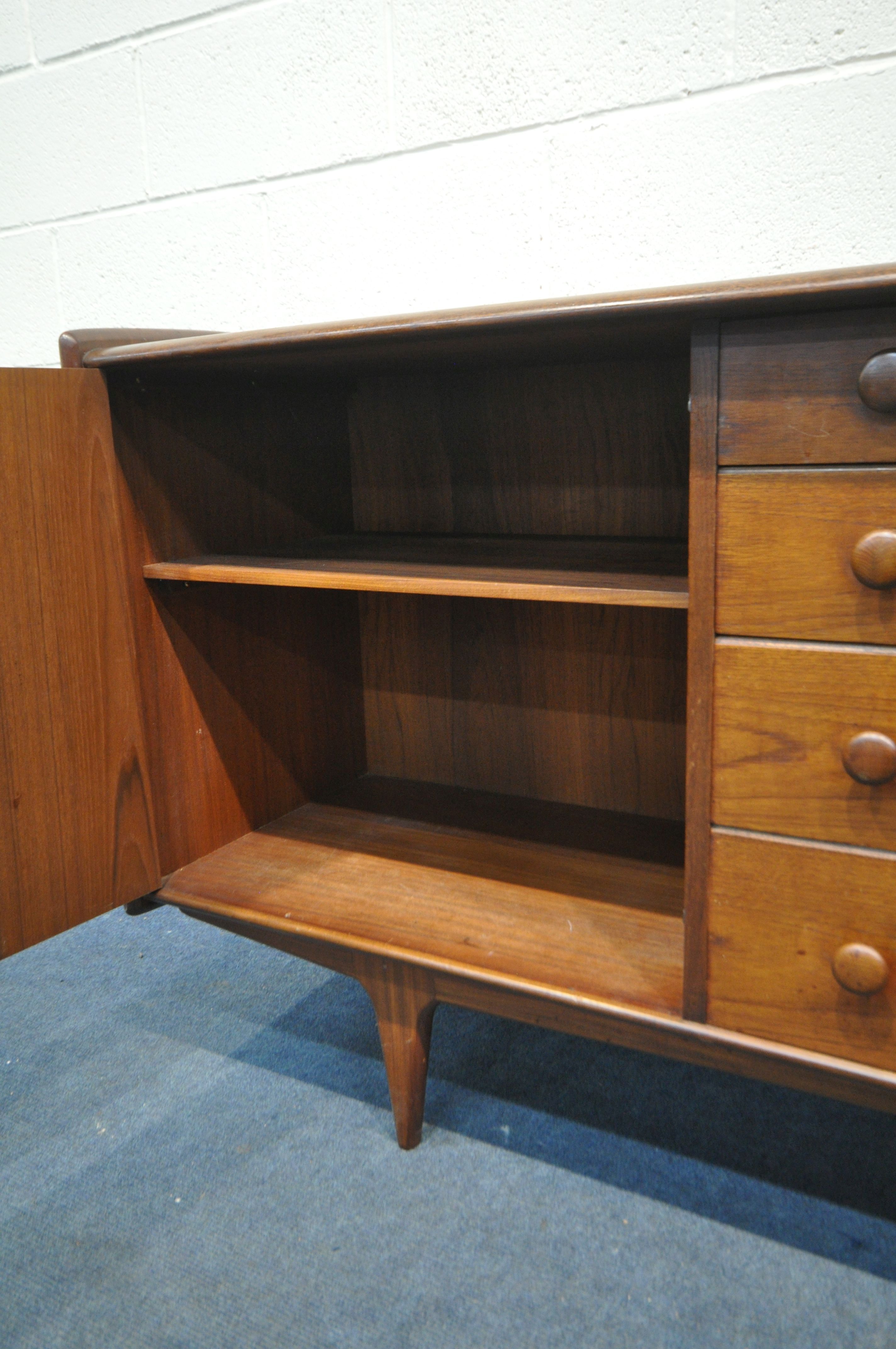 A MID CENTURY AFROMOSIA TEAK 'VOLNAY' SIDEBOARD, DESIGNED BY JOHN HERBERT FOR YOUNGER, with cupboard - Image 5 of 6