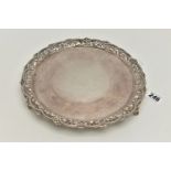 A VICTORIAN SILVER SALVER WITH A WAVY, BEADED, PIERCED AND FOLIATE CAST BORDER, worn foliate