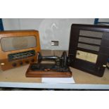 TWO LARGE RADIOGRAMS, SUNBURST CLOCK AND SEWING MACHINE, comprising a 'Seth Thomas' teak sunburst
