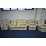 A FLORAL GOLD UPHOLSTERED FOUR PIECE LOUNGE SUITE, comprising a three seater settee, 204cm, and