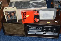 A STEREO 8 RADIOMOBILE EIGHT TRACK PLAYER WITH SPEAKER AND CASSETTES, comprising fourteen cassettes,