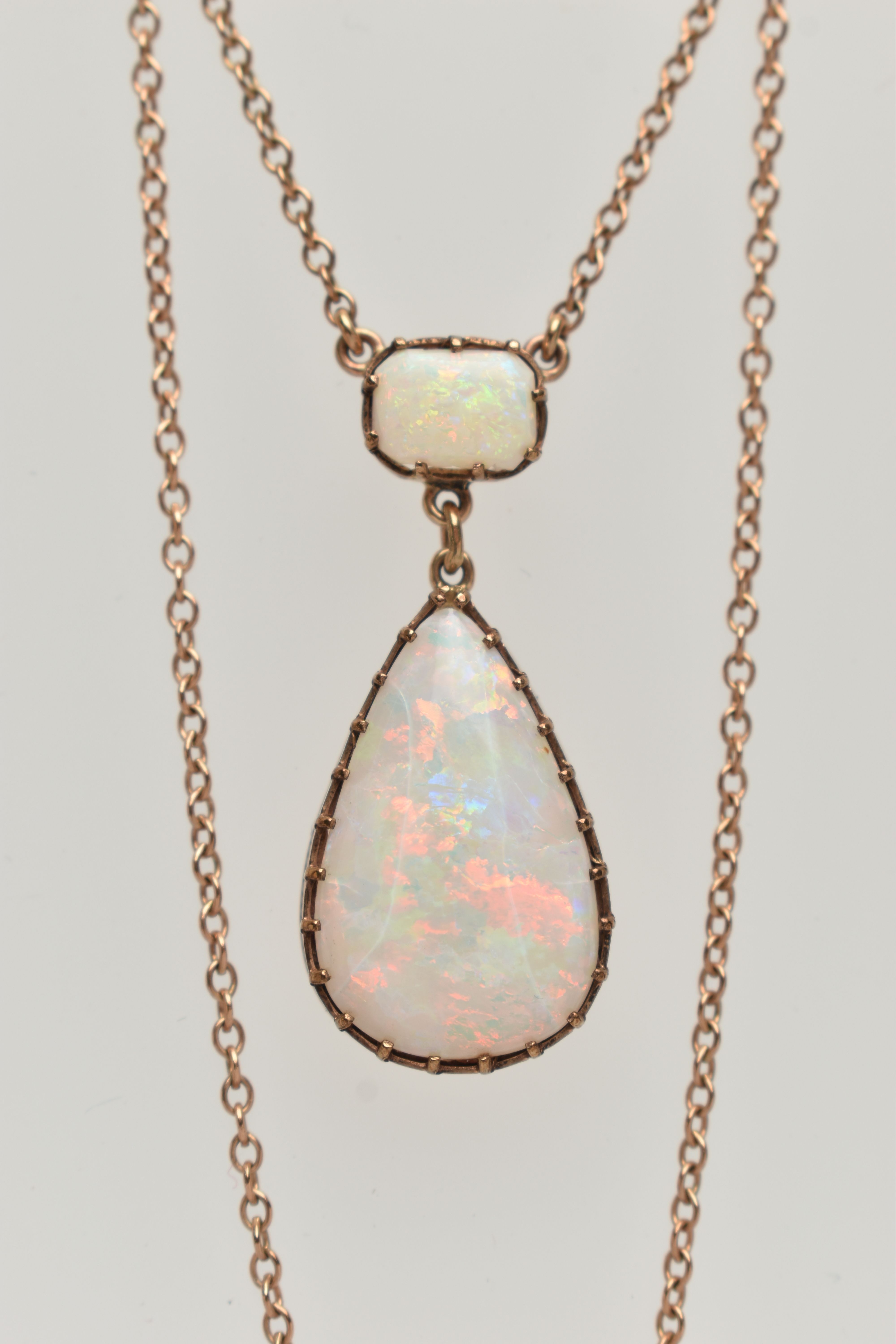 AN OPAL PENDANT NECKLACE, pear cut opal cabochon measuring approximately 22.3mm x 14.4mm, claw set - Image 2 of 5