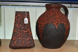 A GERMAN RED LAVA GLAZE DESIGN FLAGON, impressed Germany 990-30 on the base, together with a