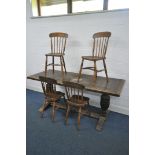 AN EARLY 20TH CENTURY OAK REFECTORY DINING TABLE, on twin acorn supports, united by a stretcher,