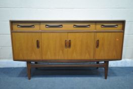 A MID CENTURY G PLAN FRESCO TEAK SIDEBOARD, with three drawers over four cupboard doors, width 153cm