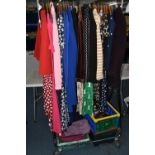 THREE BOXES AND ONE RAIL OF LADIES CLOTHING AND ACCESSORIES, to include; dresses, jackets, gloves,